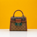 Dauphine top handle bag with doublebox